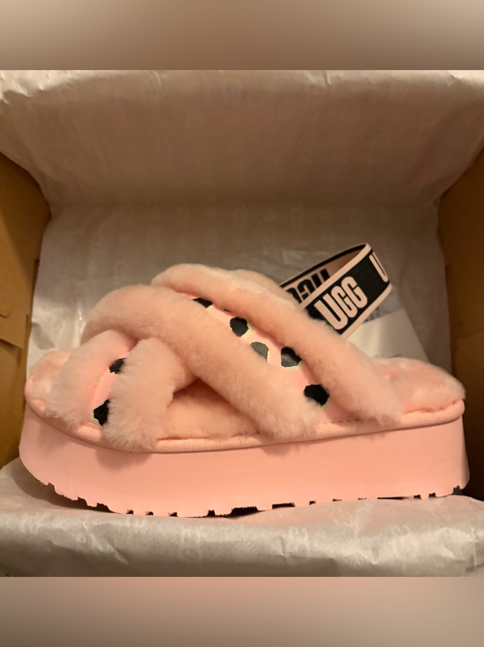 UGG DISCO CROSSED SLIDE.        
ANIMALIA PRINT